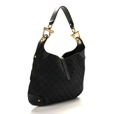 This is an authentic GUCCI Monogram Piston Lock Jackie O Hobo in Black. This hobo is crafted of black fabric canvas with black cowhide leather trim along the base and sides and a looping leather shoulder strap with a polished gold piston lock. This opens to a black fabric interior with a zipper pocket. Gucci Monogram, Fabric Canvas, Jackie O, Leather Trim, Black Fabric, Cowhide Leather, Leather Trims, Zipper Pocket, Shoulder Strap