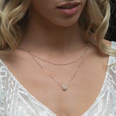 This Y Lariat Freshwater Pearl back necklace is the perfect for a low back dress. Easy to wear, hangs over your shoulders. Choose your front style (two or one row) and while the back features a Y design. Put on easily over your head. Light weight and durable; made to fit you perfectly in NYC! MATERIALS - 14K Gold over .925 Sterling Silver - Freshwater Pearls 2.5-3mm - Cubic Zirconia - Hypoallergenic, lead and nickel free DETAILS - Back Length Options: 10in (25.4cm), 12 in (30 cm), 14 in (35 cm) Elegant Layered Dangle Necklace For Party, Elegant Double Strand Backdrop Necklace With Delicate Chain, Elegant Adjustable Double Chain Necklaces, Elegant Layered Dangle Necklace With Adjustable Chain, Adjustable Elegant Layered Necklace, Elegant Layered Necklace With Adjustable Double Chain, Elegant Adjustable Layered Clavicle Necklace, Elegant Wedding Necklace With Adjustable Length, Elegant Dangle Lariat Necklace For Layering