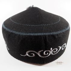 This black brimless round skullcap with white embroidery made of fleece felt. This type of headwear is known Worldwide as: tubeteika, kuchi, fez, yarmulke, taqiyah, topu, topi, round cap, kufi, kippah, kipa, koofi, kofiah, kofi, pillbox, doppi, duppi, Käppchen, Mützchen etc. Very popular in Central Asia, especially in Kyrgyzstan and Kazakhstan. This headgear is in nomadic horseman style. This hat with tassel (fringe), which can be removed easily. Please let me know you you want without it.  The Types Of Hats, Black Felt, White Embroidery, Skull Cap Beanie, Tassel Fringe, Skull Cap, Hat Making, 8 M, Caps Hats