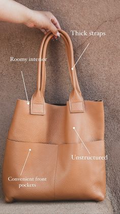 A soft, unstructured, leather tote bag that carries it all—for work and play, at home and while you travel. Classic Leather Tote, Daily Necessities, Leather Bags Handmade, Wall Pockets, Classic Leather, Leather Bags, Leather Tote Bag, Large Wall, Leather Handmade