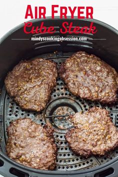 hamburger patties cooking in an air fryer with the words air fryer recipe steak