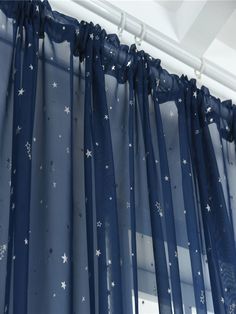 blue curtains with white stars on them