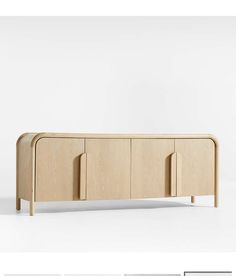 the sideboard is made out of wood and has three doors on each side, one door