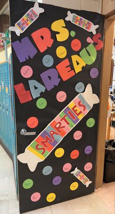 a bulletin board with the words mr and mrs harleau on it in front of lockers