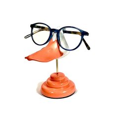 "Animal eyeglass stands from ArtAkimbo - Here's a stylish bit of waterfowl to brighten your decor whilst keeping your spectacles handy. Cast in sturdy, polished urethane, colored throughout. This little splash of room jewelry stands about 6\" tall. Glasses not included" Room Jewelry, Eyeglass Stand, Fun Sunglasses, Sunglasses Display, Eyeglass Holder, Cool Sunglasses, Cute Room Decor, Jewelry Stand, Polymer Clay Crafts