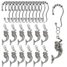 an assortment of silver colored metal fish hooks