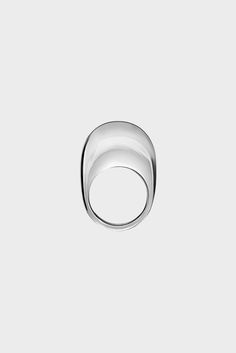 This item is final sale. Our statement Swipe design is inspired by the 'swipe to unlock' icon of an iPhone. Here it has been translated into a silver ring design in collaboration with London-based/Brazilian-born jeweller Alan Crocetti who is noted for his bold and sculptural gender-neutral designs. All accessories are final 100% Silver Contemporary Open Ring With Polished Finish, Contemporary White Gold Rings With Polished Finish, Modern White Gold Open Dome Ring, Modern Silver Signet Ring, Modern Silver Ring With Polished Finish, Modern Sterling Silver Dome Ring, Modern Silver Dome Ring, Modern Polished Finish Open Ring, Alan Crocetti