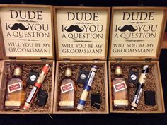 three boxes with different types of liquor in them