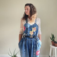 Vintage denim overalls with hand painted red, yellow, and white flowers. Vintage Spring Overalls, Vintage Fitted Overalls For Spring, Vintage Fitted Spring Overalls, Fitted Vintage Overalls For Spring, Spring Distressed Overalls, Vintage Relaxed Fit Overalls, Yellow And White Flowers, Ice Tie Dye, Denim Jumper Dress