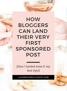 someone holding a wine glass with the words how bloggers can land their very first sponsored post