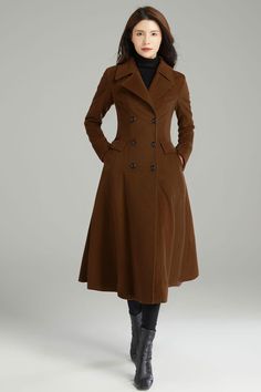 This is a beautiful, classic wool coat with a modern fit.Perfect for autumn or winter wear! This wool coat style is perfect for the winter months and the fabric is cosy and soft, with a double-breasted front fastening and a large lapel collar in a variety of colours for you to choose from. ★★ FEATURES 50% wool blend, 50% fiber, nylon Polyester lining Two side pockets Double breasted wool coat Notched collar wool coat Long sleeve wool coat Fit and flare wool coat Regular fit wool coat Mid calf wool coat Perfect for winter, autumn ★★Mode size Height 170cm (5′ 7″) Bust 84 cm (33") Waist 66 cm (26") She wears size XS. ★★Bespoke Order Service If you Request other color Request the length Your height is not between 155 cm- 175 cm Your weight is not between 47 kg -77 kg I can do it for you, It wi