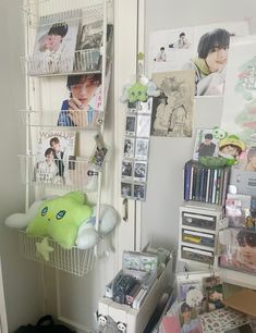 a room filled with lots of clutter and pictures