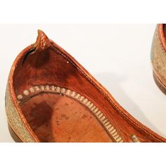 A pair of rare late 19th century hand stitched and hand tooled leather shoes with hand embroidered with gilt metallic threads. Amazing antique Mughal gold embroidered traditional Islamic Indian leather shoes fit for a Maharaja. Arabic Persian Turkish Moorish Mughal style Curled Toe Leather Shoes. These sparkly leather slippers (mojari or khussa) from India have upturned toes that are purely decorative. Embroidered with excessive amounts of gold and silver thread, with red and purple accent the s Curl Styles, Purple Accents, Leather Slippers, Hand Tooled Leather, Metallic Thread, Leather Tooling, Leather Shoes, Hand Stitching, Hand Embroidered