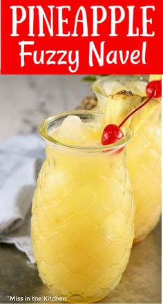 two glasses filled with pineapple fuzzy navel