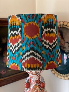 This is large sized Empire shade (11.75 x 13.75 x 11.75) with a spider fitting. If you'd prefer an Uno or Duplex fitting, it's available by request. This lampshade is handmade, with vintage, hand printed, hand woven, and/or hand dyed fabric. There will be slight differences, and tiny flaws that would not appear on a mass produced item. I make the shades as carefully as possible, so if there’s ever a problem, please contact me. I’m always happy to work out an exchange or return if you are unsatis Hand Dyed Fabric, Ankara Fabric, Dyed Fabric, Asian Style, Fabric Swatches, Hand Woven, Hand Dyeing, Hand Weaving, Blue And White