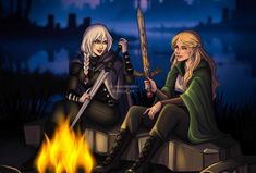 two women sitting next to each other holding swords in front of a campfire at night