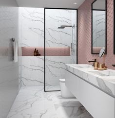 a bathroom with marble walls and flooring