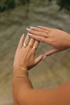 14k gold filled sequin chain with rollo chain connected to plain stacking ring Please select your preferred ring size, bracelet size, and connection piece size. Please note that bracelet comes with a 1" extension chain To measure connection piece, lay your hand flat and measure from the bottom of your finger to where you want your bracelet to lay. Model is wearing a 4.5" connector. If you wish to have a size other than the options listed, please email keikojewelry@gmail.com or leave a note at checkout. Processing Time: Each piece is made to order & takes approximately 10-14 business days to ship. If you do need your order sooner, please select the "RUSH MY ORDER" add on for an additional fee. *Rush orders must be discussed and approved prior to purchase to ensure appropriate materials are Bracelet Connected To Ring, Minimalist Gold-plated Jewelry With Extender, Minimalist Gold Plated Jewelry With Extender, Gold Dainty Promise Chain Ring, Dainty Gold Promise Chain Ring, Everyday Resizable 14k Gold Filled Jewelry, Dainty 14k Gold-filled Promise Jewelry, Dainty 14k Gold Filled Jewelry For Promise, Dainty 14k Gold Filled Promise Jewelry