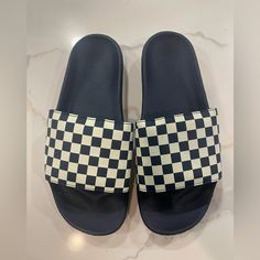 Vans Men's Slide-On Navy Blue And White Checkboard Slides Sandals 100% Authentic. Brand New Without Tags. Purchase Directly From Vans. Style Code: Vn0a33tyq4d-Men Color: Navy Blue And White Description: Vans Checkerboard Navy Blue And White Slide Sandals. Vans Offering Ultimate Comfort And All-Day Ease, The Newly Designed Checkerboard Slide-On Sandal Features An Outsole Made Of Ultra-Durable, Lightweight Pu And A Classic Synthetic Leather Foot Strap Showcasing The Classic Vans Checkerboard Print Blue Slides For Summer, Navy Cushioned Slides For Summer, Navy Sandals With Branded Insole For The Beach, Navy Slides With Cushioned Footbed For Summer, Casual Navy Sandals With Cushioned Footbed, Casual Navy Flat Sandals, Navy Casual Open Toe Sandals, Casual Navy Slides With Cushioned Footbed, Navy Beach Slides With Cushioned Footbed