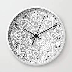 a black and white clock with an intricate design on the face, it's hand drawn