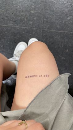 a woman's legs with the words tell it is worth written on her thigh