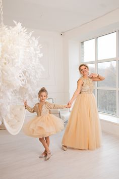 Mother Daughter Champagne Matching Dress, Sequin and Velour Dress, Matching Wedding Dress Champagne twinning dresses made of velour with sequins. Mommy Maxi sleeveless tutu dress with zipper on backside. Daughters dress is above knee length tutu puffy dress with deep V neckline and long sleeves. Color and fabric: tulle, velour with sequins and cotton Length of the dresses can be made as you wish. Additional cost may be applied For better fit you can leave in the note to seller box (on checkout) Princess Style Evening Dress For Holiday, Holiday Celebration Tulle Dress, Fitted Tulle Dress For Celebration, Princess Style Sleeveless Celebration Dresses, Gold Long Sleeve Dress For Dress-up, Gold Ball Gown Princess Dress For Parties, Sleeveless Tulle Dress For Celebration, Little Mermaid Dresses, Sparkly Party Dress