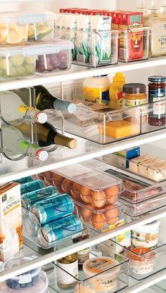 a refrigerator filled with lots of food and condiments on it's shelves