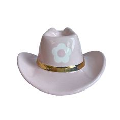 Description Add a touch of country charm to your space with this colorful ceramic cowboy hat decor. Whether you're a fan of the Wild West or simply looking to add a pop of color to your home, this ceramic cowboy hat is the perfect choice. Place it on a shelf, mantel, or use it as a centerpiece to create a fun and stylish focal point in any room. Our hats are hand-poured in Oklahoma and hand-glazed by a Ruby Clay artist before being fired for a beautiful and durable finish. This style features a Cowboy Hat Decor, Retro Western Aesthetic, Hat Decor, Blue Harvest, Love Pink Wallpaper, Clay Artist, Western Aesthetic, Colorful Ceramics, The Wild West