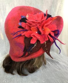 Love how this hat came out ! Red wet Felted flapper hat Ooak . Decorated with wet Felted flower. Beaded . Mannequin head size is 21 , will fit up to 23.5 created as one of a kind. Brim can be pulled o we the ears . Feel free to email me any questions. Thanks. Red Short Brim Cloche Hat For Fall, Red Mini Hats With Curved Brim For Winter, Red Wool Winter Hat, Red Brimmed Mini Hat For Winter, Red Wide Brim Mini Hat For Winter, Red Brimmed Felt Hat For Winter, Red Cloche Hat With Curved Brim For Winter, Red Winter Cloche Hat With Curved Brim, Red Wool Felt Hat For Winter