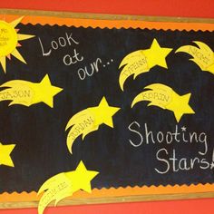 a chalk board with writing on it that says look at our shooting stars written in yellow