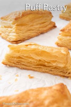 puff pastry cut in half on top of white paper with text overlay that says puff pastry