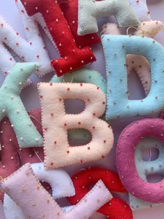 the letters are made out of felt and sequins