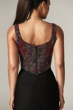 'Amalia' is designed in our floral Garden Print that we're loving for this season and making it perfect for romantic date nights. Cut from stretch crepe, 'Amalia' is fitted with our incredible corsetry boning to snatch the waist and the wide straps frame the feminine curved neckline.It has a longline silhouette that dips below the natural waistline and zips up the back for easy on. It's fully lined for comfort and we love this styled with our Joselyn Jeans for a chic match. As corsets are design Fitted Corset Dress With Lined Bodice For Garden Party, Floral Print Underbust Corset, Fitted Corset Dress With Sweetheart Neckline For Garden Party, Floral Print Fitted Corset, Floral Print Overbust Corset With Fitted Bodice, Fitted Boned Bodice Corset For Garden Party, Fitted Floral Print Corset Dress, Floral Print Fitted Corset For Party, Fitted Floral Print Party Corset