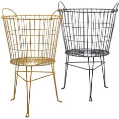 two metal chairs sitting next to each other