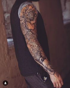 a man with a tattoo on his arm