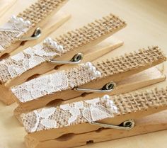 there are some wooden clothes pins with lace on them and the words to be featured is bridals pegpen london, cut 2014