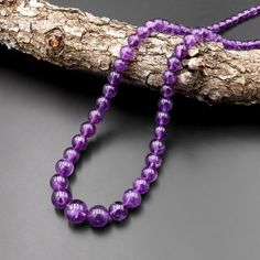 "Bead size: graduated from 4mm to 12mm Necklace length: approximately 20\" Guaranteed 100% natural amethyst not treated in any way... Very nice gemmy purple color!  We usually ship every day from Mon-Sat (except postal office holidays) and will do our best to ship on the same day when payment is received. Your satisfaction is our ultimate goal. Please feel free to email us your feedback, suggestions, questions, comments and how much you love your purchase and everything else." Office Holiday, Pearl Strands, Bead Stringing, Purple Amethyst, Love Your, Purple Color, Round Beads, Gemstone Beads, Necklace Lengths