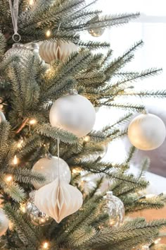 a christmas tree with ornaments hanging from it