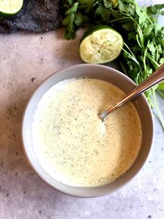 a bowl filled with creamy cilantro lime dressing