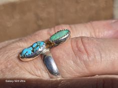 https://boonesilver.etsy.com/listing/1646372320 Morenci turquoise was mined in Arizona at the Morenci mine. It was closed decades ago and only found in private collections today. These small Morenci cabs are sky blue with natural pyrite. The cabs are stabilized. Perfect gift for wife. Ring size: 9 Lightning Ridge Opal: 1.25 ct, 8x10mm. Morenci turquoise: 3.75ct, 9x13mm. Hallmarked: MSBOONE 925 Spiritual Untreated Turquoise Ring Gift, Unique Turquoise Multi-stone Opal Ring, Unique Turquoise Opal Ring With Multi-stone Design, Unique Turquoise Opal Ring For Gift, Oval Multi-stone Turquoise Ring Gift, Unique Turquoise Opal Ring For Anniversary, Southwestern Turquoise Opal Ring Gift, Southwestern Style Turquoise Opal Ring As Gift, Southwestern Style Turquoise Opal Ring Gift