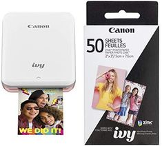 a canon printer with its box next to it's packaging and the package is open