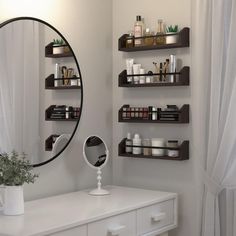 a mirror and shelves in a room