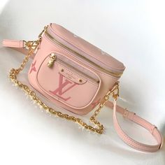 Mini Bumbag handbag from the LV Gradient series, which renders the gradient midsummer color for the Monogram embossing of Monogram Empreinte leather. The on-trend shape features a zipped main compartment, and a Louis Vuitton leather label accents the front pocket. Clever use of the detachable chain and detachable and adjustable shoulder strap, the shoulder and crossbody can be converted at will.

Size: 17.0 x 12.0 x 9.5 cm (LxHxW)
• Monogram Empreinte embossed soft-grain calfskin
• Textile l Luxury Belt Bag With Top Handle, Luxury Pouch Bag With Zipper Pocket, Luxury Belt Bag With Zipper Pocket, Luxury Rectangular Belt Bag With Zipper Pocket, Luxury Belt Bag With Zipper For Daily Use, Luxury Belt Bag With Zipper Closure, Louis Vuitton Yayoi Kusama, Louis Vuitton Mini, Louis Vuitton Capucines