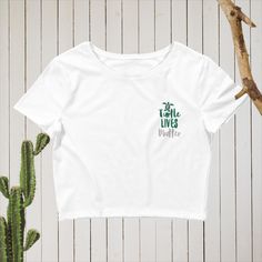 This is a brand new offering for my store. Turtle Lives Matter is embroidered on the left upper pocket area. The season's trendiest garment - the crop top. This top is tight-fitting but still incredibly comfortable, and it hits just above the navel. * 52% combed ring-spun cotton, 48% polyester * Fabric weight: 3.6 oz/yd² (122 g/m²) * 40 singles * Slim fit * Side-seamed construction * Blank product sourced from Nicaragua, the US, or Honduras This product is made especially for you as soon as you Casual Fitted Tops With Embroidered Graphics, Fitted Cotton Tops With Embroidered Graphics, Casual Embroidered Organic Cotton Tops, Organic Cotton Crew Neck Tops With Embroidered Text, Organic Cotton Crew Neck Top With Embroidered Graphics, Casual Cotton Shirt With Embroidered Text, Embroidered Turtle, Crop Top Tees, Wildlife Conservation