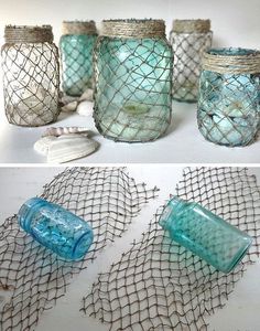 there are several glass jars with fishing nets on the top and bottom, one is empty