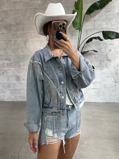 We are obsessed with this denim jacket! This unique denim jacket features a crop, an adorable rhinestone fringe around the front and back in a chevron design! Pair with our 27 Austin Rhinestone Denim Shorts for the matching set! **letters on back of black jacket are not included** Material 90% Cotton, 10% Viscose. Fit Info Fits true to size for a relaxed fit. Size up for a more oversized fit. Size Small measures 18" in length. Model in first 3 images is 5’7” and normally a Small, but sized up to Unique Denim Jacket, Denim Rhinestone, Rhinestone Denim, Rhinestone Fringe, Fringe Jacket, Chevron Design, L And Light, Pink Jacket, White Jacket