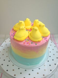 there is a cake with yellow birds on it