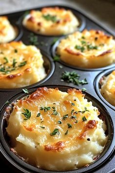 baked potatoes in a muffin tin with parsley on top