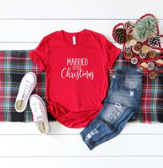 - Custom 'Married Christmas' bridal shirt for the new bride's first Christmas! ITEM DETAILS: - Pictured: Red with White Lettering - Shirt Lettering: Married Little Christmas in White Lettering - Sizes: S, M, L, XL, XXL (Select size in the drop down menu above) - Unisex Fit, relaxed. *Please leave date needed in the notes section of the order If this is a rush order, please contact me for upgraded shipping and rush options before placing the order. Care Instructions - Turn garment inside out and Coffee And Christmas, Cute Christmas Shirts, Womens Christmas Shirts, Merry Christmas Svg, Holiday Svg, Merry Christmas Shirts, Funny Christmas Shirts, Christmas Tees, Holiday Shirts