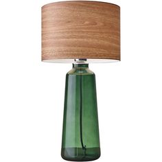 a green glass lamp with a wooden shade on the base and a light brown drum